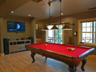 Our game room in the lake house featuring a pool table, 55
