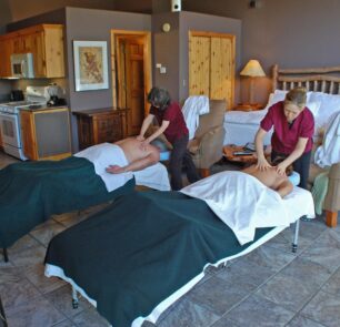 A relaxing couples massage is given by our professional masseuses inside a cabin.